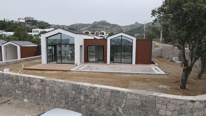 Вилла 6+1 с видом на море в Бодрум