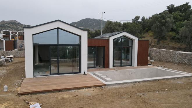 Вилла 6+1 с видом на море в Бодрум