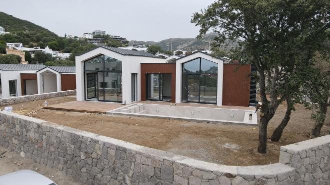 Вилла 6+1 с видом на море в Бодрум