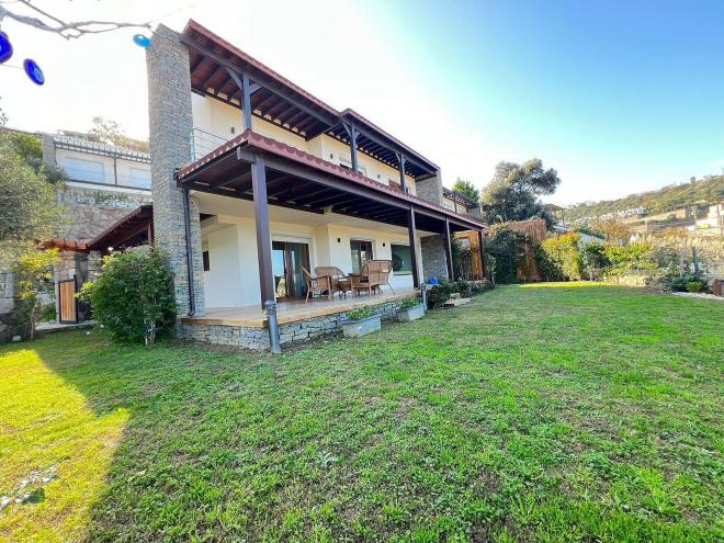 Вилла 4+1 с видом на море в Бодрум