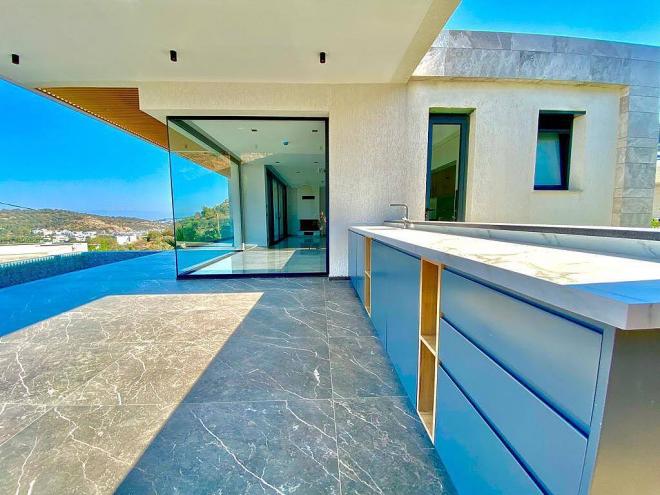 Вилла 5+1 с видом на море в Бодрум