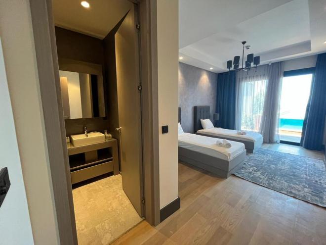 Вилла 4+1 с видом на море в Бодрум