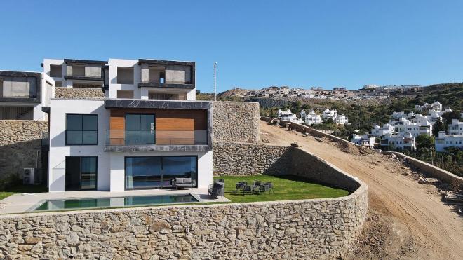 Вилла 4+1 с видом на море в Бодрум