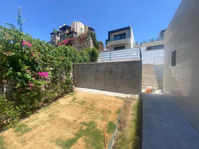 Вилла 6+1 с видом на море в Бодрум