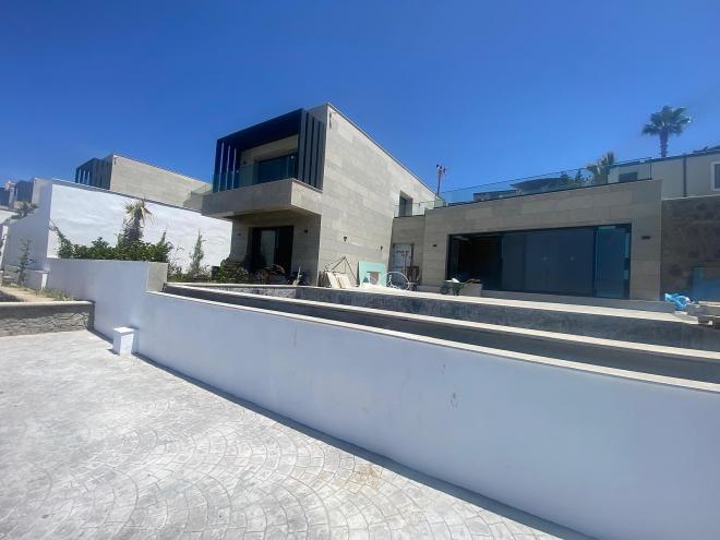 Вилла 6+1 с видом на море в Бодрум