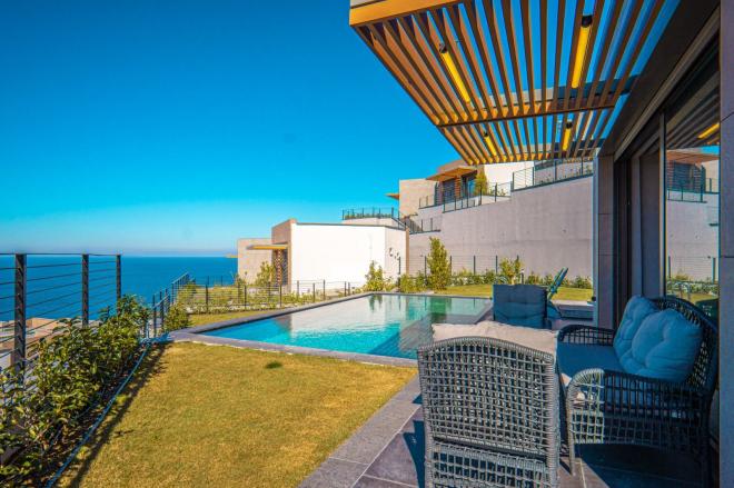 Вилла 5+1 с видом на море в Бодрум