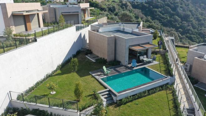 Вилла 5+1 с видом на море в Бодрум