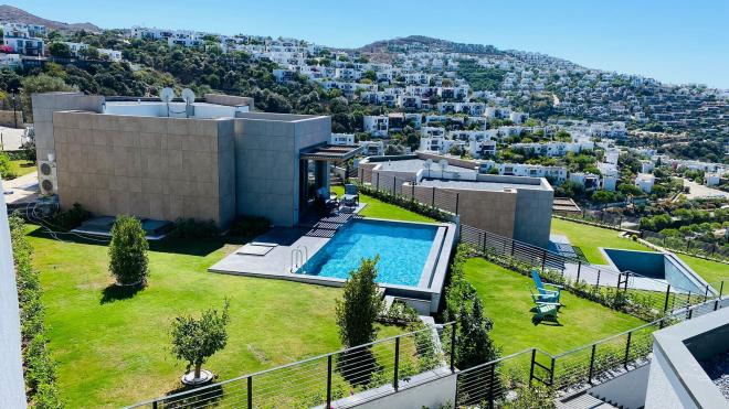 Вилла 5+1 с видом на море в Бодрум