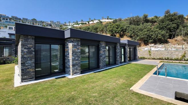 Вилла 4+1 с видом на море в Бодрум