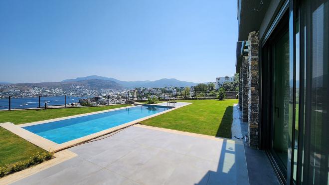 Вилла 4+1 с видом на море в Бодрум