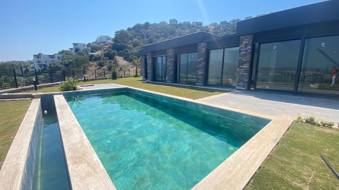 Вилла 4+1 с видом на море в Бодрум