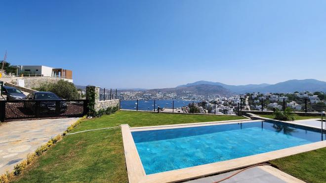 Вилла 4+1 с видом на море в Бодрум