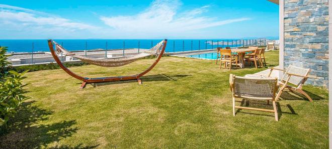 Вилла 4+1 с видом на море в Бодрум