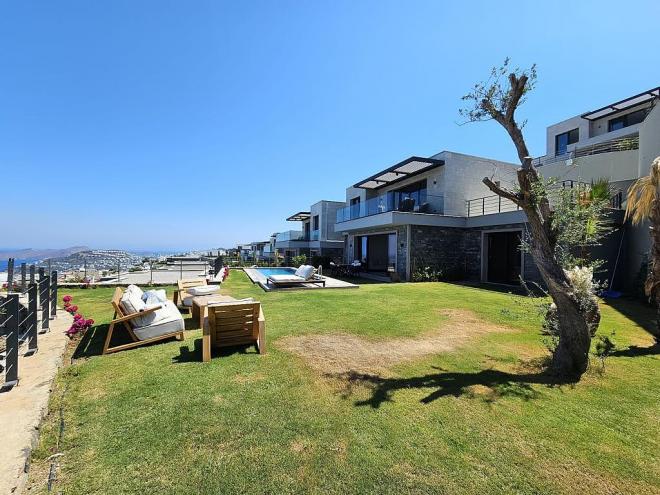 Вилла 4+1 с видом на море в Бодрум