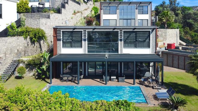 Вилла 5+1 с видом на море в Бодрум