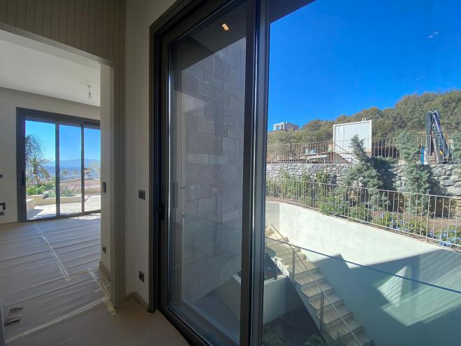 Вилла 5+2 с видом на море в Бодрум