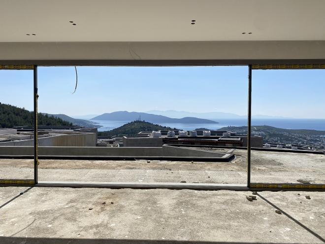 Вилла 5+2 с видом на море в Бодрум