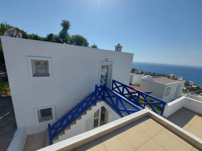 Вилла 3+1 с видом на море в Бодрум