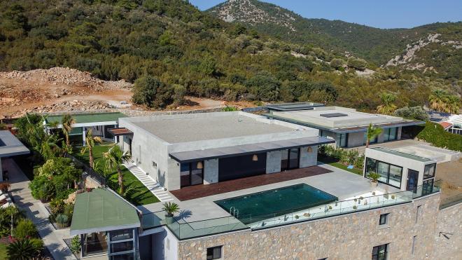 Вилла 7+2 с видом на море в Бодрум