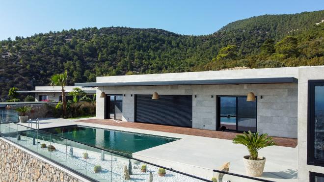 Вилла 7+2 с видом на море в Бодрум