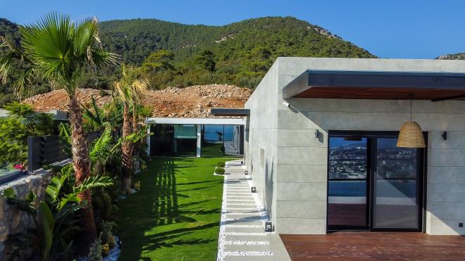 Вилла 7+2 с видом на море в Бодрум