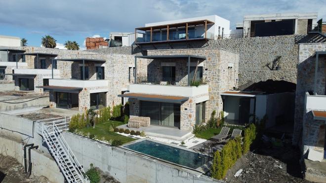 Вилла 4+1 с видом на море в Бодрум