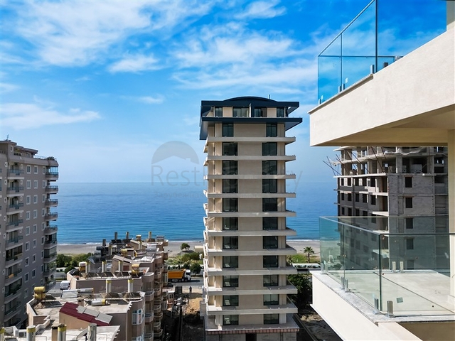 Роскошный проект на первой береговой линии в Махмутларе