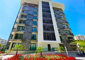 Квартира 1+1 от известного застройщика в 200 м от моря в районе Тосмур