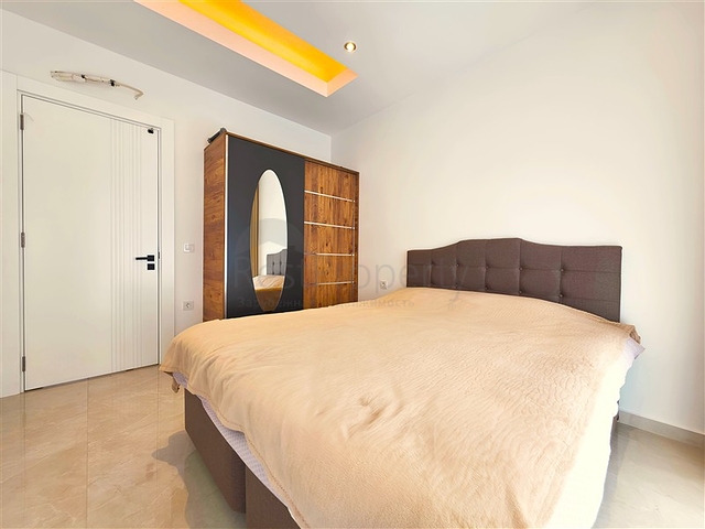 Современная меблированная квартира 1+1 в новом комплексе в центре Аланьи