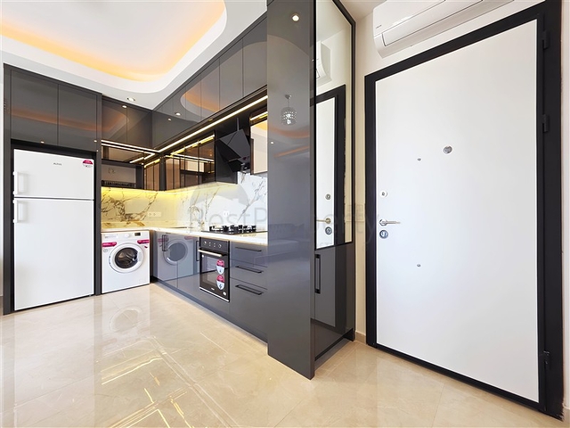 Современная меблированная квартира 1+1 в новом комплексе в центре Аланьи