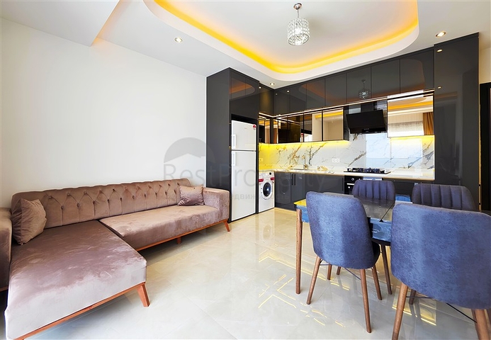 Современная меблированная квартира 1+1 в новом комплексе в центре Аланьи