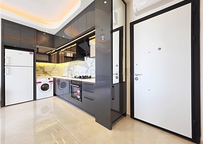 Современная меблированная квартира 1+1 в новом комплексе в центре Аланьи