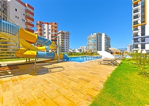 Квартира 1+1 в новом комлпексе в районе Махмутлар 