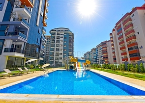 Квартира 1+1 в новом комлпексе в районе Махмутлар 