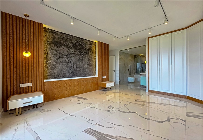 Эксклюзивные апартаменты планировкой 4+1 в уникальном комплексе центральной части Аланьи