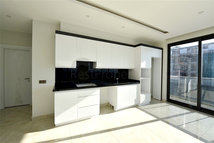 Квартира 2+1 с панорамным видом на море в районе Махмутлар