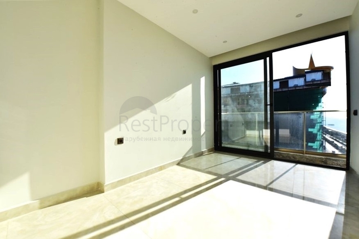 Квартира 2+1 с панорамным видом на море в районе Махмутлар