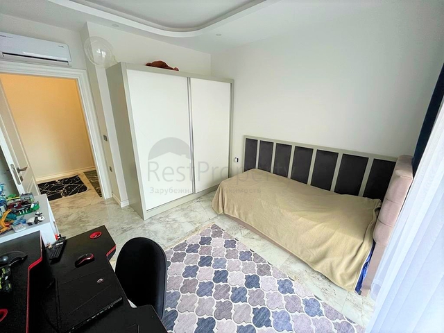 Двухэтажный садовый дуплекс 2+1 в районе Оба 