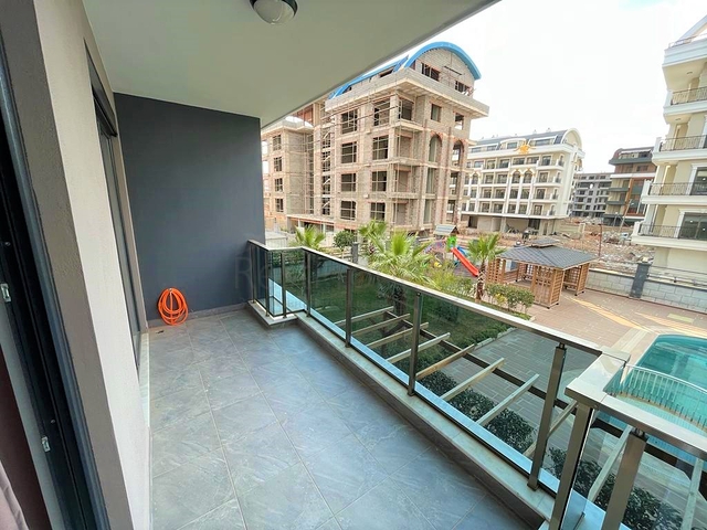 Двухэтажный садовый дуплекс 2+1 в районе Оба 