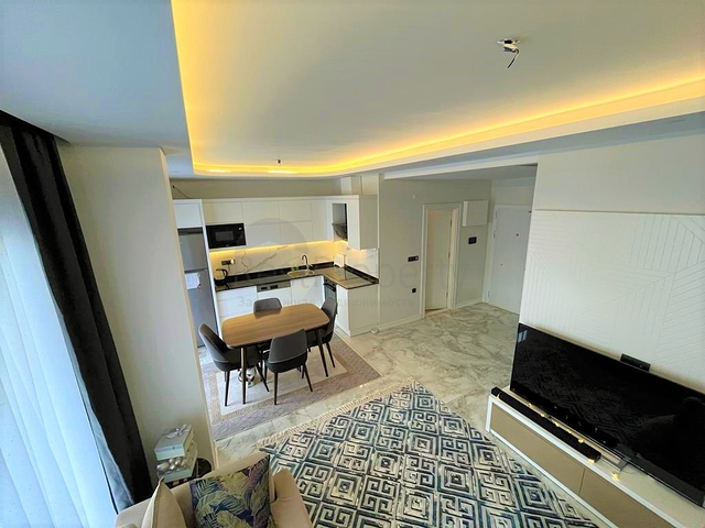 Двухэтажный садовый дуплекс 2+1 в районе Оба 