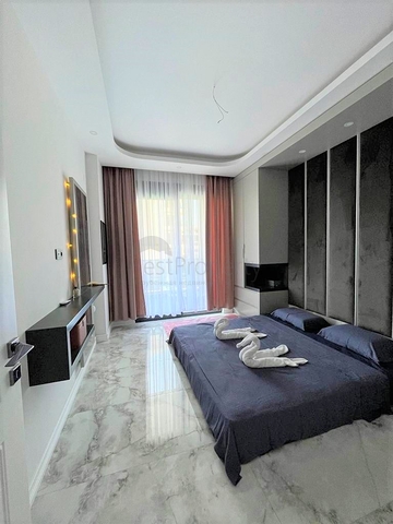 Двухэтажный садовый дуплекс 2+1 в районе Оба 