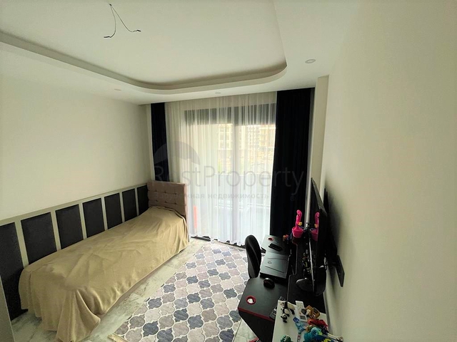 Двухэтажный садовый дуплекс 2+1 в районе Оба 