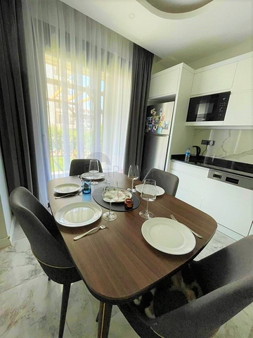 Двухэтажный садовый дуплекс 2+1 в районе Оба 