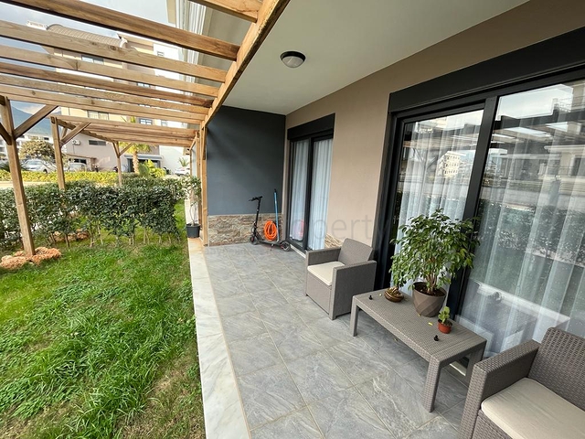 Двухэтажный садовый дуплекс 2+1 в районе Оба 