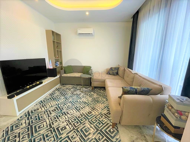 Двухэтажный садовый дуплекс 2+1 в районе Оба 