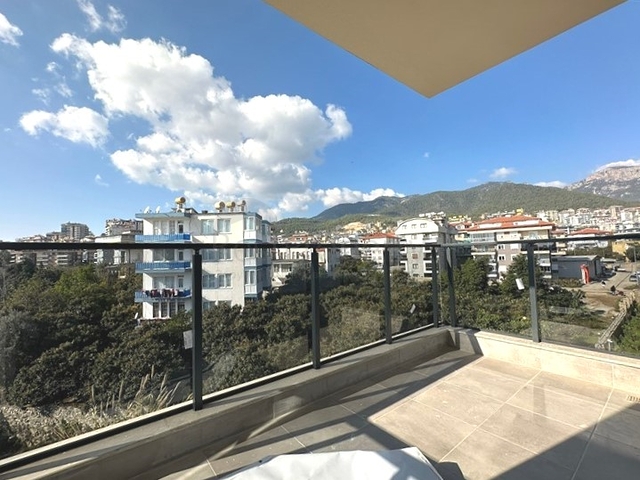 Квартира в Оба планировки 2+1 с отдельной кухней