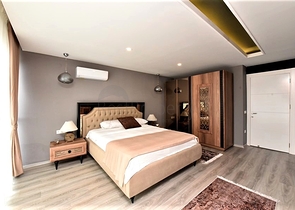 Трехэтажная вилла планировкой 5+1 в самом центре Алании