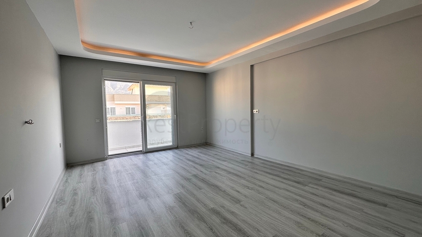 Пентхаус 2+1 в центре Махмутлара с видом на горы 