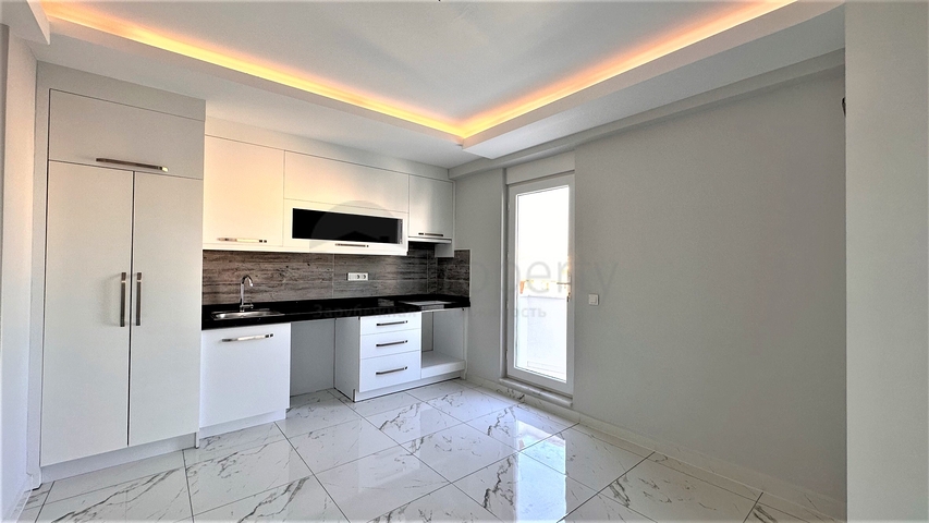 Пентхаус 2+1 в центре Махмутлара с видом на горы 