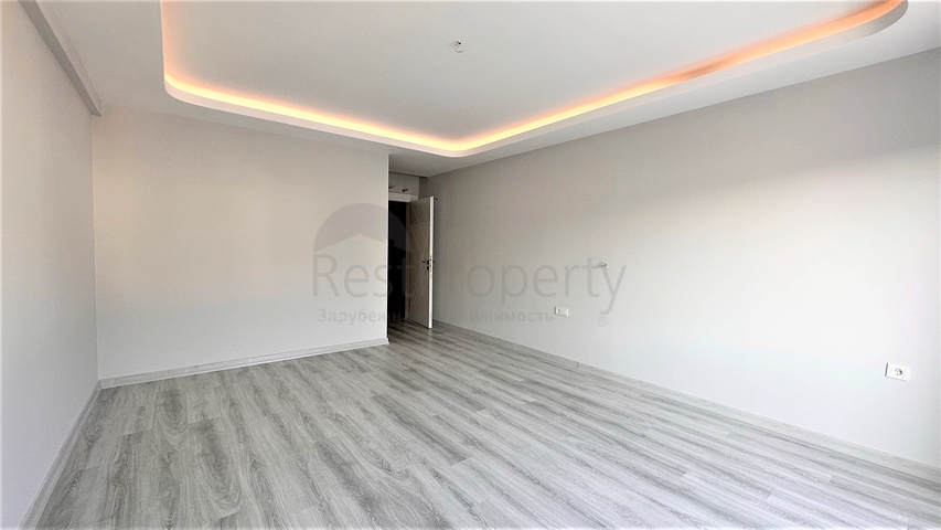 Пентхаус 2+1 в центре Махмутлара с видом на горы 